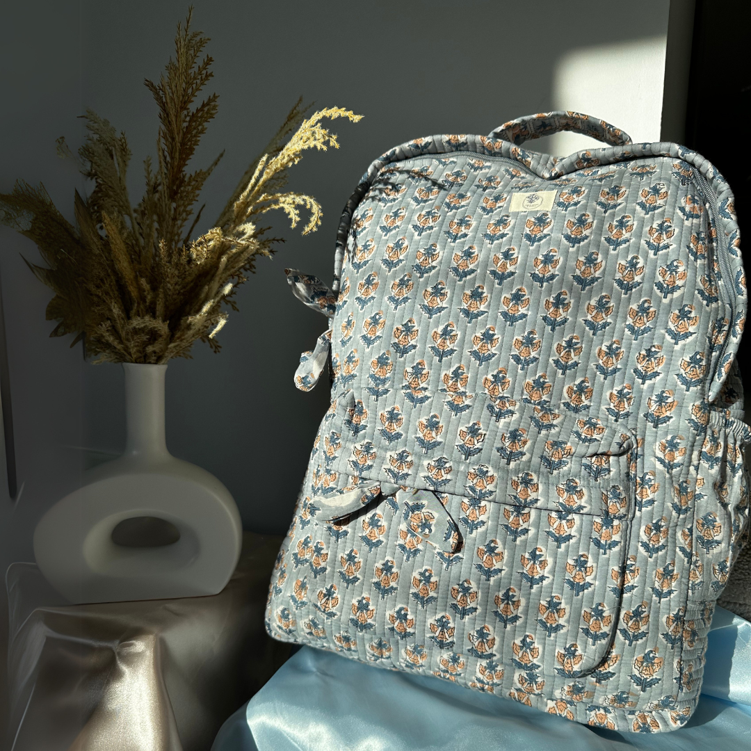 frost-and-blossom-weekender-backpack-side