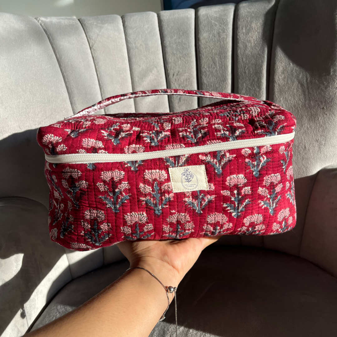 maroon-mist-vanity-bag-in-hand