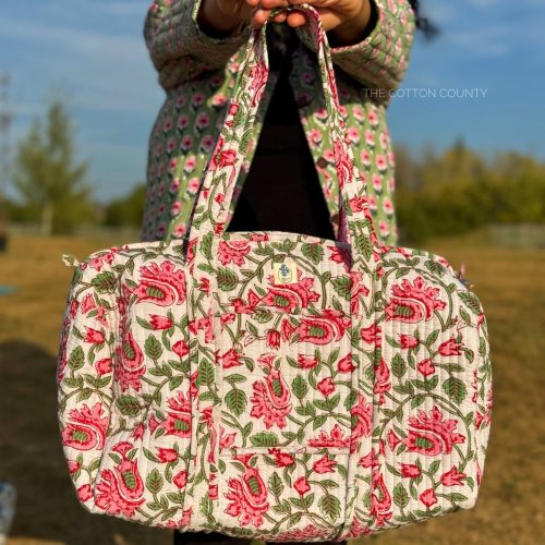 pink and white duffel